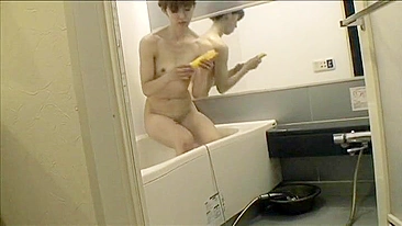 Sultry Japanese wife masturbates on hidden cam for your enjoyment. Uncensored