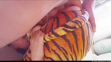 Pornstar in tiger suit takes cock deep down her throat and pussy