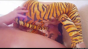 Pornstar in tiger suit takes cock deep down her throat and pussy