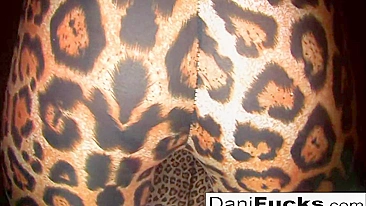 Swanky chick Dani Daniels in leopard outfit stimulates clitoris to the full