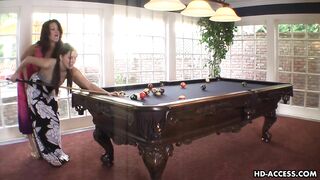 Mature woman teaches young stepdaughter to play pool and use a good vibrator