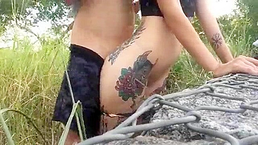 Slightly-built girlfriend with tattoos fucked from behind in hiding place