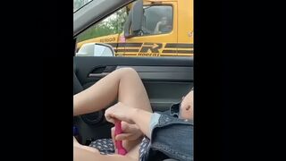 Orgasm on highway when the trucker watch me masturbate,  while my husband is driving