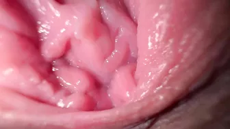 Sexy girl in close-up, talking dirty while spreading her wet pussy.