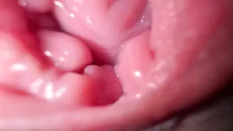 Sexy girl in close-up, talking dirty while spreading her wet pussy.