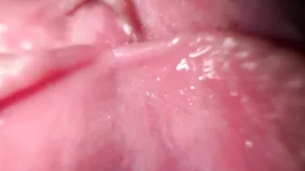 Sexy girl in close-up, talking dirty while spreading her wet pussy.