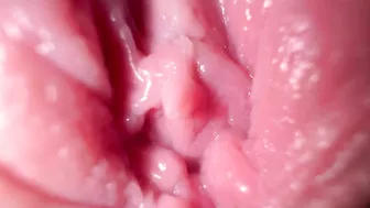 Sexy girl in close-up, talking dirty while spreading her wet pussy.