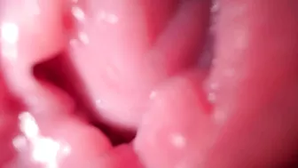 Sexy girl in close-up, talking dirty while spreading her wet pussy.