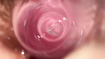 Lena's teenage pussy is filled with a transparent dildo in this intimate camera shot.