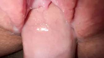 Sexy young girl with incredibly tight and creamy pussy in close-up shot.