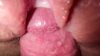 Sexy young girl with incredibly tight and creamy pussy in close-up shot.