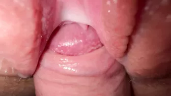 Sexy young girl with incredibly tight and creamy pussy in close-up shot.