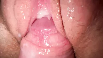 Sexy young girl with incredibly tight and creamy pussy in close-up shot.