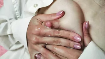 Sexy lactating mother pleasuring her breasts in erotic play. Sexy lactating mother pleasuring her breasts in erotic play.