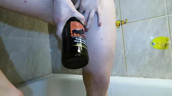 Sultry teen enjoys ginger wine and gets horny with bottle action.