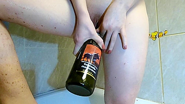 Sultry teen enjoys ginger wine and gets horny with bottle action.