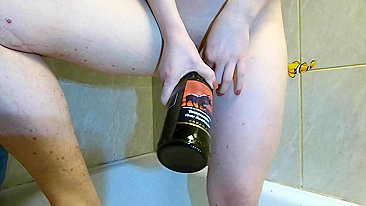 Sultry teen enjoys ginger wine and gets horny with bottle action.