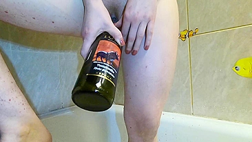 Sultry teen enjoys ginger wine and gets horny with bottle action.