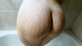 Ginger ass treat pouring big fit hips red bathroom home.