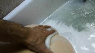 Rub your back while enjoying wet ginger teen pussy in a foamy bath at home.