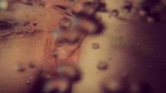 This compilation features a young redhead with a fantastic butt and pussy, showcasing her assets in various positions.