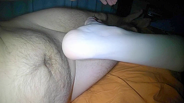 A steamy footjob and doggy-style fuck with a massive cumshot in her pussy.