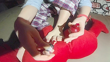 Red toenail painting by ginger teen in foot fetish video for real lovers.