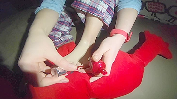 Red toenail painting by ginger teen in foot fetish video for real lovers.