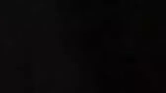 Redheaded girl dancing nude in rain with big natural breasts.