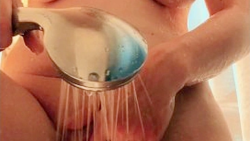 Gorgeous busty woman showers with round ass and cum shot.