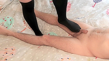 Sensually rub your feet in nylon stockings while masturbating with a sockjob and cumshot.