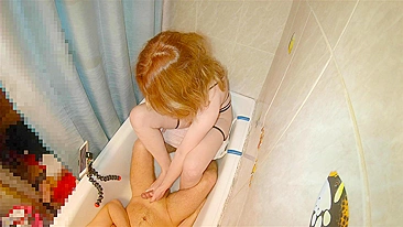Redhead teen strokes herself with foot and hand until she cums.