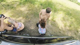 Two sexy hitchhikers have fun in a car ride with a foursome orgy and gorgeous views.