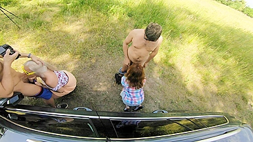 Two sexy hitchhikers have fun in a car ride with a foursome orgy and gorgeous views.