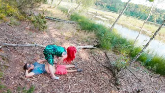 Poison Ivy kisses Batman while riding him in a forest lake until he creams her pussy.