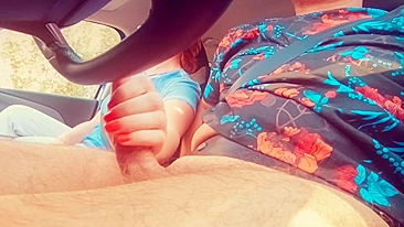 I assisted my driver in relaxing during a long road trip by providing a sensual hand job while he was driving.