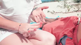 Redhead in white dress flashes and blows at risky public beach; cumshot ensues.