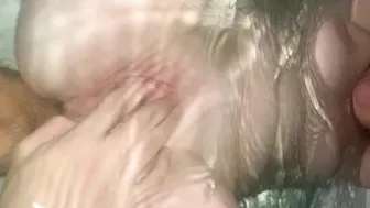 Underwater ginger pussy fingering and footjob with extreme closeups and creampie.
