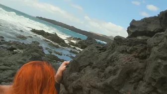 Red-haired woman standing on beach having sex and cream pie, risqué. Red-haired woman standing on beach having sex and cream pie, risqué.