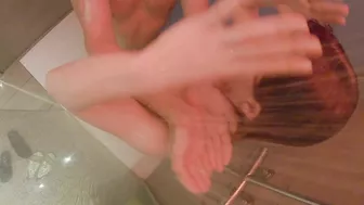 Gorgeous curvy girl showers and washes with natural big tits and ginger hair.