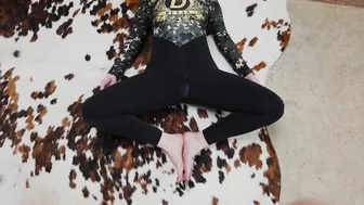 Red-haired teen doing yoga in sports bodysuit gets covered in cum.