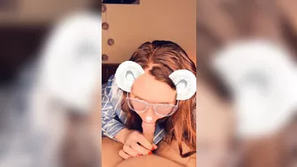 A redhead in glasses sucks cock until she orgasms on camera.