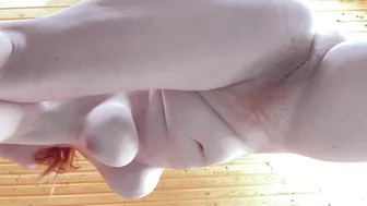 Yoga and masturbation with a curvy redhead gymnast with big tits, hairy pussy, and pale skin.