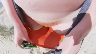 Strangers caught my wife in her swimsuit panties on a public beach. She has big tits and a hairy pussy.