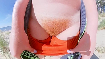 Strangers caught my wife in her swimsuit panties on a public beach. She has big tits and a hairy pussy.