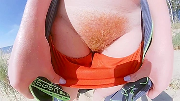 Strangers caught my wife in her swimsuit panties on a public beach. She has big tits and a hairy pussy.