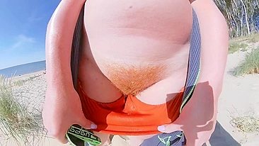 Strangers caught my wife in her swimsuit panties on a public beach. She has big tits and a hairy pussy.