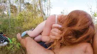 Sexy redhead MILF blows hair stylist in public beach.