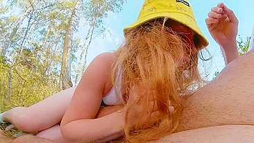 Sexy redhead MILF blows hair stylist in public beach.
