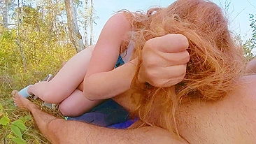 Sexy redhead MILF blows hair stylist in public beach.